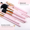 Image of 12-Piece Pink Synthetic Makeup Brush Set with Holder - Travel-Friendly Organizer for Foundation, Powder, Contour, Blush, and Eye Cosmetics, Includes Bonus Makeup Sponge